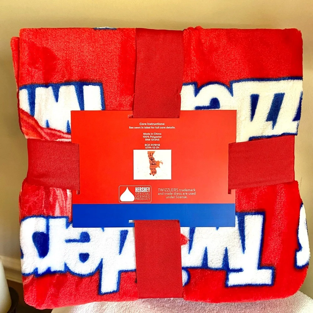 Twizzlers NWT large plush throw blanket in the iconic red and white logo 50”x60”